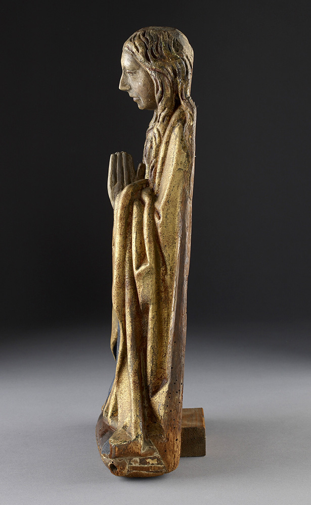 Carved wooden figure representing the Virgin Mary seen from the side with Mary facing left,  dating to 1451-1500