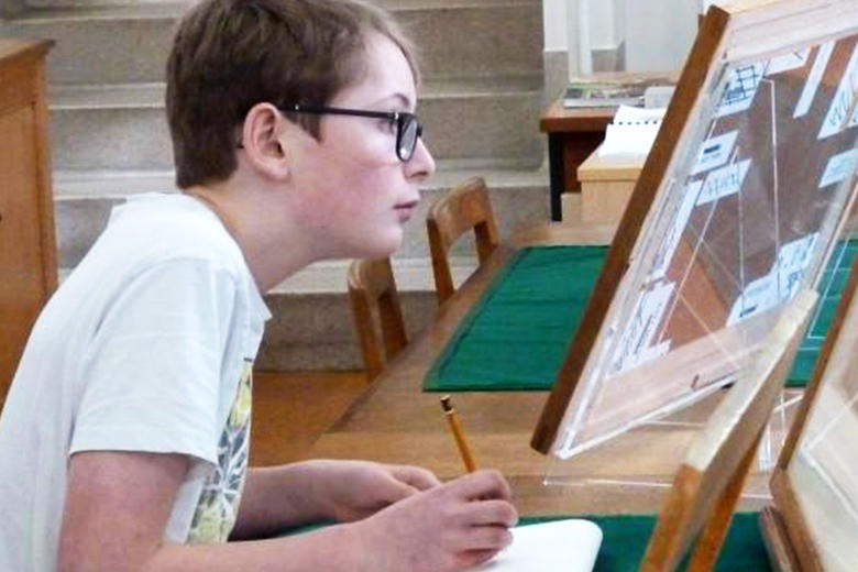 Boy drawing in the Print Room
