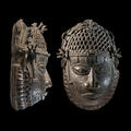 Front and side view of an ornate bronze mask from Benin