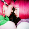 Photograph by Ninagawa Mika of two pink-haired young women facing each other