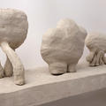Daphne Wright's little clay Ugg figures with strange protuberances and blobs for bodies