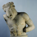 Marble sculpture of the mythical minotaur, with a bull's head a human torso