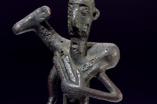 Statuette of a worshipper carrying a ram (detail), Sardinia, 8th century BC