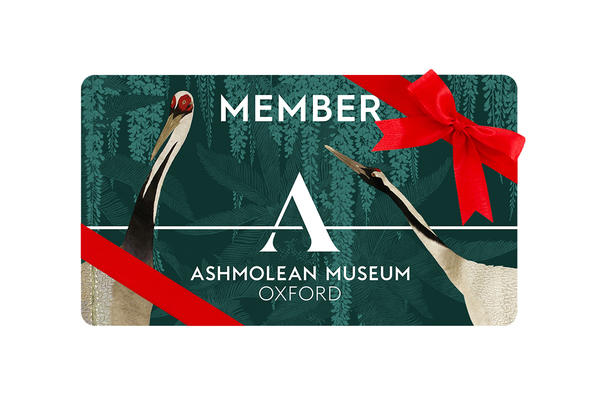 Ashmolean Gift Membership Card wrapped in a red ribbon and bow