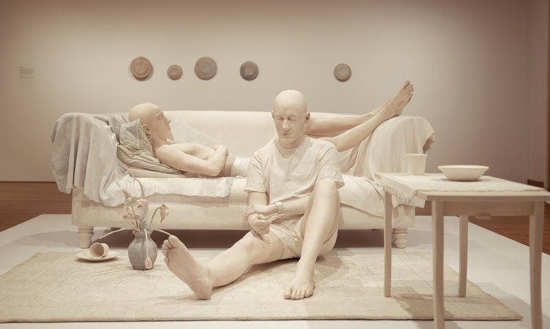 Sons and Couch life-size clay sculpture and back wall in Daphne Wright exhibition