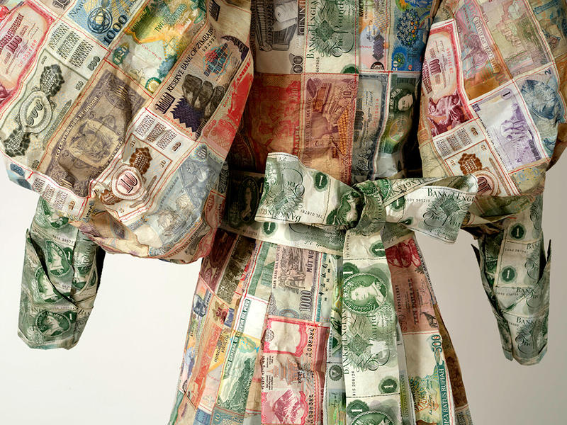 A detail of artist Susan Stockwell's Money Dress made with bank notes 
