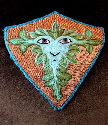 The Green Man medieval embroidery design in rich colours