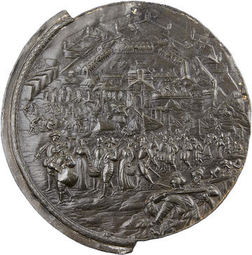 A cast lead plaquette with a design showing the liberation of Antwerp.