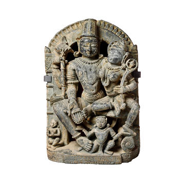 Stone sculpture of the gods Vishnu and Lakshmi